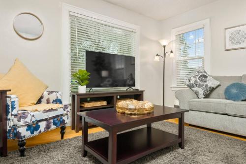 a living room with a couch and a table at Edwards Retreat in Newberg