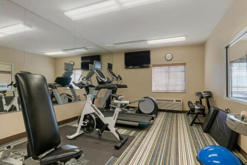 a fitness room with treadmills and exercise equipment at Candlewood Suites Reading by IHG in Reading
