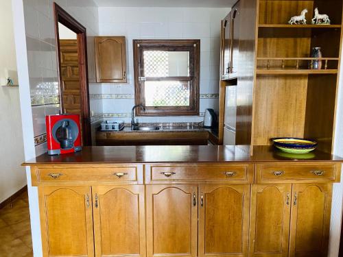 Kuchyň nebo kuchyňský kout v ubytování Apartamento Bellavista IV