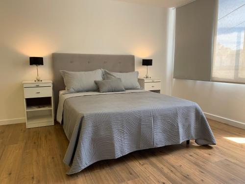 Postel nebo postele na pokoji v ubytování Baires Apartament