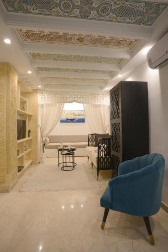 Ein Bett oder Betten in einem Zimmer der Unterkunft Dar Hammamet Guest House & Hammam
