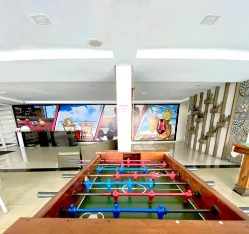 a poker room with poker tables in a casino at Beira Mar Imperial Flat 612 in João Pessoa