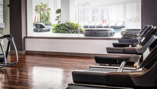 a row of chairs in a waiting room at Wyndham Grand Bangsar Kuala Lumpur in Kuala Lumpur