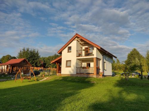 Vonkajšia záhrada v ubytovaní Sunny Lake House Warmia i Mazury jezioro Dadaj