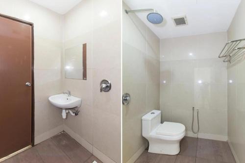 uma casa de banho com um WC e um lavatório em Bintang Garden Hotel em Kuala Lumpur