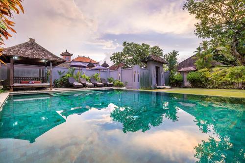 an image of a swimming pool in a house at Bali Villa Lotus in Seminyak