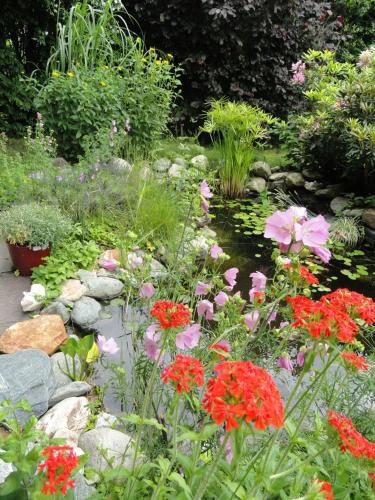 Κήπος έξω από το Ruhige Wohnung mit schönem Eigengarten in Seeboden am Millstättersee