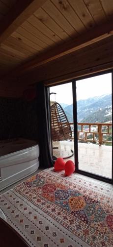 Ένα ή περισσότερα κρεβάτια σε δωμάτιο στο Ekakta bungalov