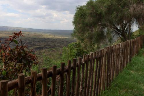 a wooden fence on the side of a field at Maili Saba Camp in Nakuru