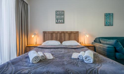 Posteľ alebo postele v izbe v ubytovaní Gudauri Cozy Home