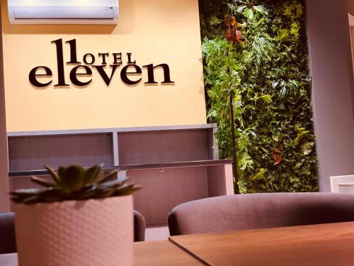 a restaurant with a sign that reads hotel eleven at Eleven Hotel Baku in Baku