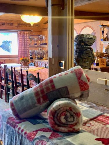 Ένα ή περισσότερα κρεβάτια σε δωμάτιο στο Casanova nelle Dolomiti