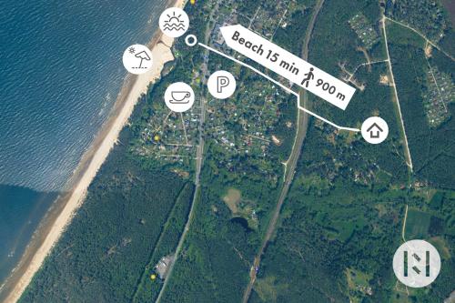 an island with a street sign and some icons at Rabarberi LV just 15min walk to SeaSide in Saulkrasti