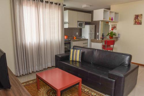 
Uma área de estar em Residencial Flat Villa Rosa
