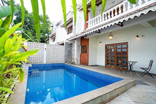 Bazén v ubytování OV Private Pool Villas near Baga, I 4BHK units I Staff nebo v jeho okolí