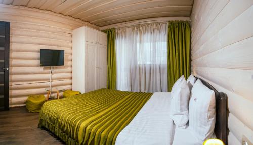 Postel nebo postele na pokoji v ubytování Whiteberry hotel