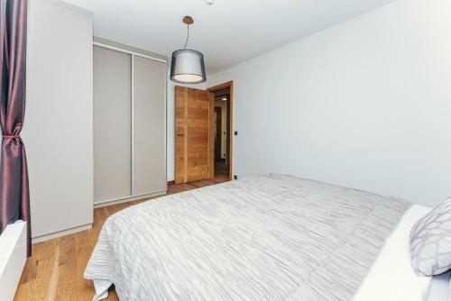 Ένα ή περισσότερα κρεβάτια σε δωμάτιο στο Luxury Apartments Adelka