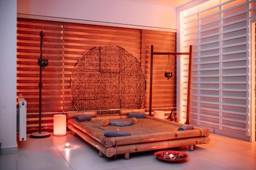 a room with a large bed in the middle of it at Monte Baia Uludağ - Full Board Plus in Uludag
