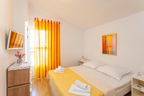 Posteľ alebo postele v izbe v ubytovaní Apartman Prlić 3
