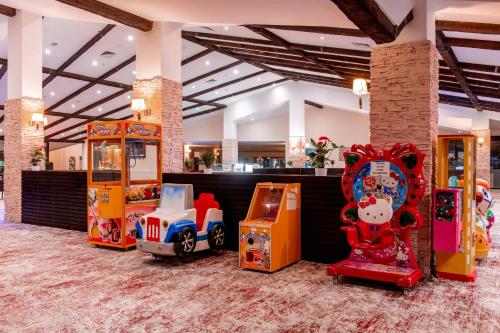 a group of arcade games in a lobby at Monte Baia Uludağ - Full Board Plus in Uludag
