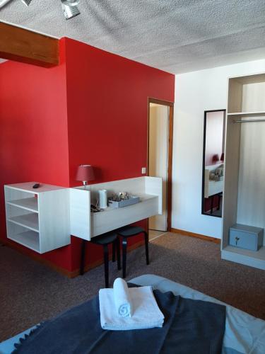Postel nebo postele na pokoji v ubytování Hotel Chalet du Crey