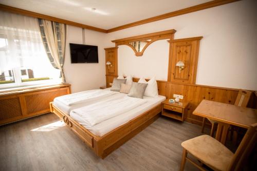 Postel nebo postele na pokoji v ubytování Pension Knoll