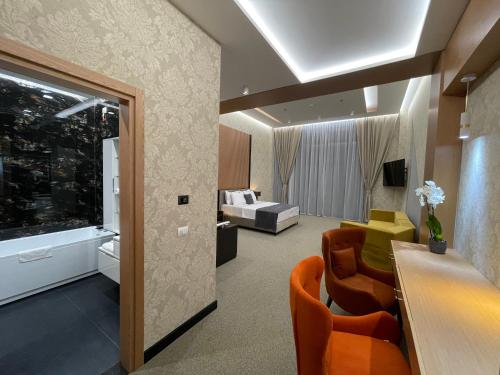 Postel nebo postele na pokoji v ubytování Deluxe Resort and SPA