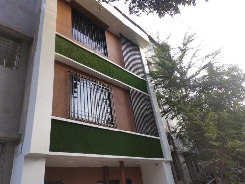 a building with bars on the side of it at Mahalaxmi Executive in Kolhapur
