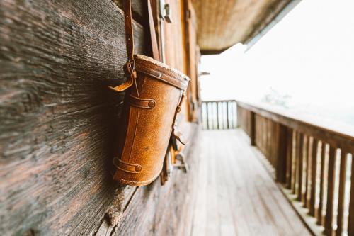 a brown object is hanging on a wall at Almhaus Rinner in Greith