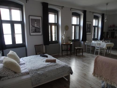Óváros Apartmanにあるベッド