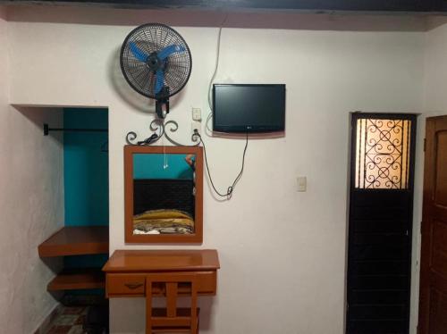 TV a/nebo společenská místnost v ubytování Hotel Clasico Colonial