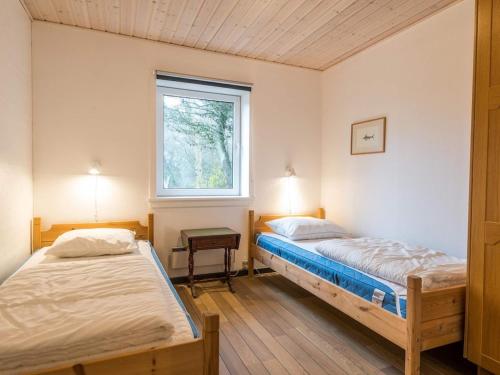 Postel nebo postele na pokoji v ubytování Holiday home Fanø CXXVIII