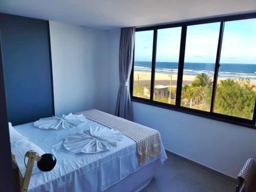Ένα ή περισσότερα κρεβάτια σε δωμάτιο στο Maly Boutique Hotel