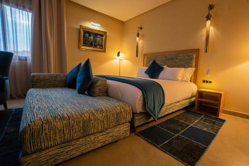 Postel nebo postele na pokoji v ubytování SUMAHAN SUITES & SPA