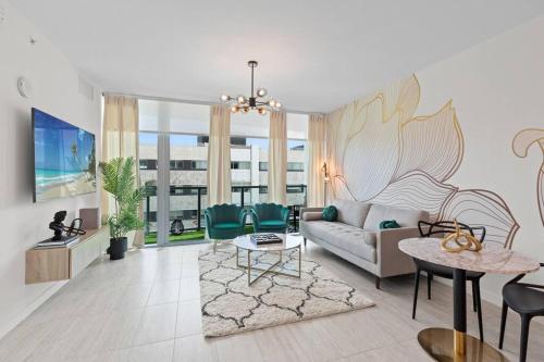 a living room with a couch and a table at LUXURY 1 BDRM/1B APT IN MIAMI DESIGN DISTRICT AREA in Miami
