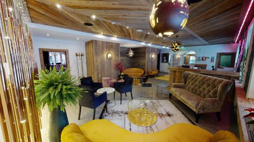 Posezení v ubytování Hotel Panther'A