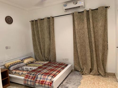 Ένα ή περισσότερα κρεβάτια σε δωμάτιο στο SUCCESS ROOM Ensuit - East Legon, Adjiringanor