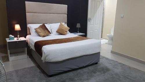 Krevet ili kreveti u jedinici u okviru objekta InstaHomes by Tru - Hillside Suite