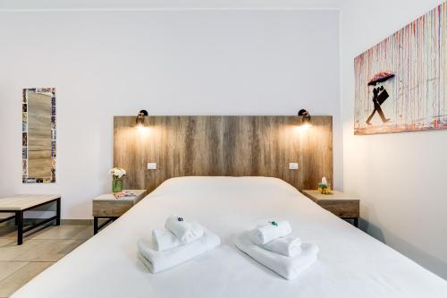Postel nebo postele na pokoji v ubytování B&B Casa Der Poeta