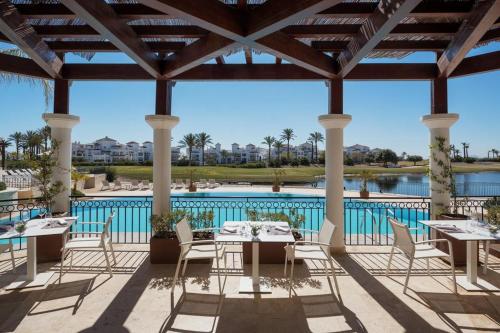 Foto da galeria de Fantastica villa con piscina en gran golf resort em Roldán