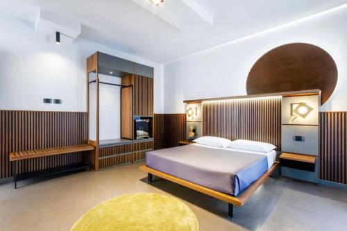 Ένα ή περισσότερα κρεβάτια σε δωμάτιο στο Hotel Vespucci