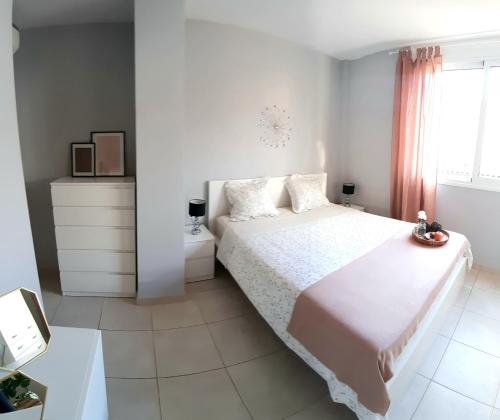 Postel nebo postele na pokoji v ubytování Cozy apartament in the heart of Santa Cruz