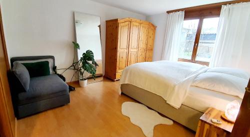 Postel nebo postele na pokoji v ubytování 2 rooms Appartment "Home, Swiss Home"