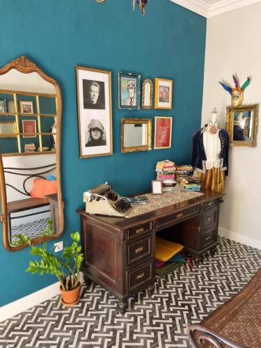 a dressing room with a desk and a mirror at House Grabic in Tivat