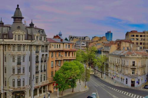 a view of a city with buildings and a street at TAJ Royal APARTMENT in Bucharest