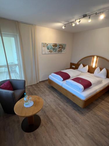 En eller flere senger på et rom på Hotel garni St.Georg