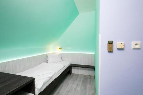 Katil atau katil-katil dalam bilik di Hotel N