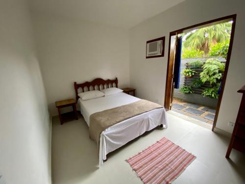 Katil atau katil-katil dalam bilik di PROXIMO CENTRO HISTÓRICO - Piscina - AR CONDICIONADO