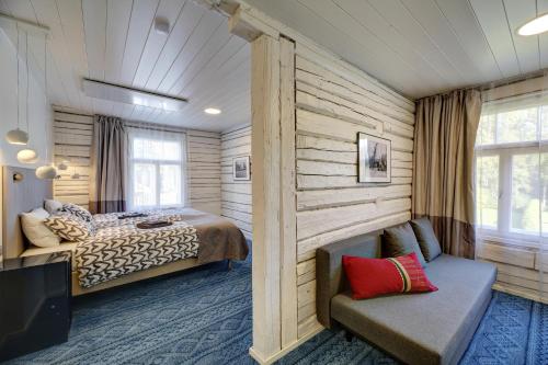 Tõstamaa Meierei Hotel tesisinde bir odada yatak veya yataklar
