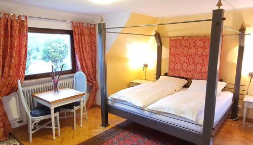 Säng eller sängar i ett rum på Apartment Haus Pflingsteck nahe Europa Park Rulantica